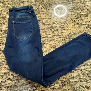 Distressed skinny high rise